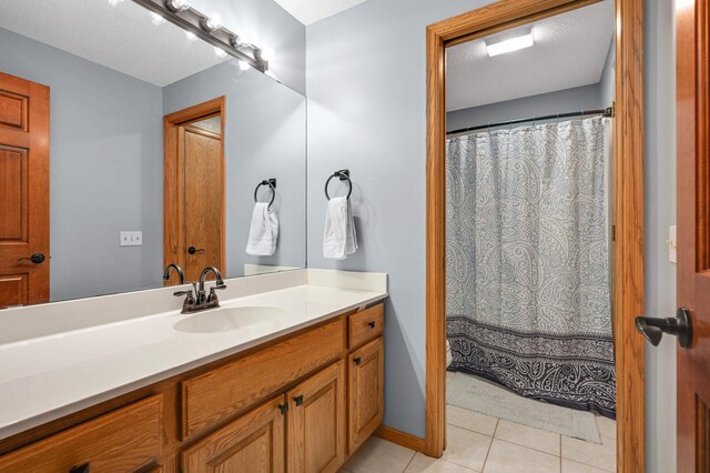 3583 Woodland Trl, Eagan, MN 55123 - bathroom with tile patterned floors and vanity