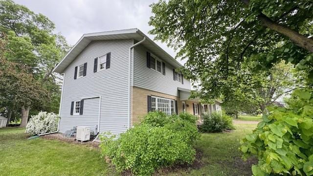 811 Myrtle St, Buffalo, MN 55313 - view of property exterior with a yard