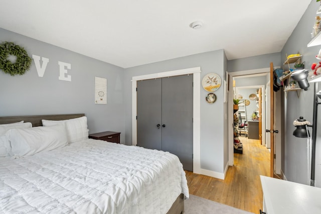 4638 Johnson St NE, Columbia Heights, MN 55421 - bedroom featuring light wood-style flooring and a closet