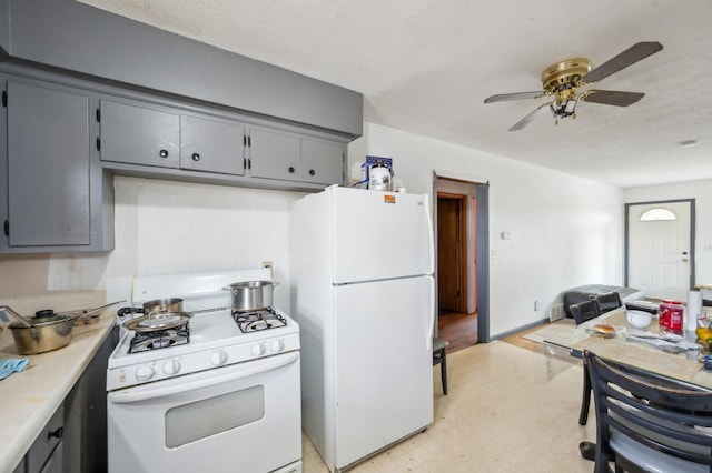 4638 Johnson St NE, Columbia Heights, MN 55421 - kitchen featuring white appliances, a ceiling fan, gray cabinetry, light countertops, and a textured ceiling