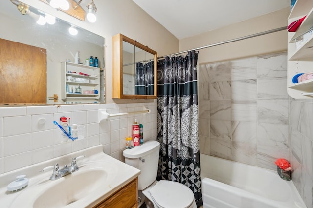 4638 Johnson St NE, Columbia Heights, MN 55421 - bathroom with vanity, shower / bath combination with curtain, and tile walls
