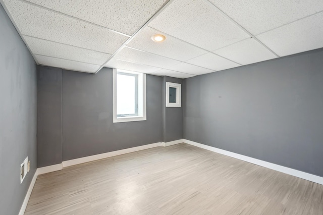 4638 Johnson St NE, Columbia Heights, MN 55421 - below grade area with wood finished floors and a paneled ceiling