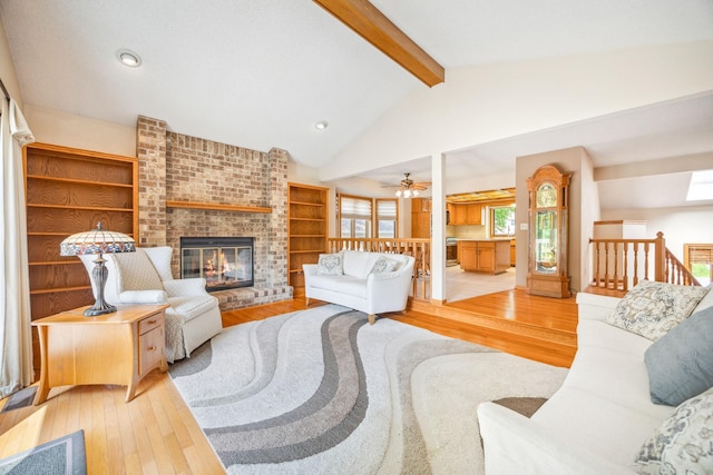 2017 87th Trl N, Brooklyn Park, MN 55443 - living area with hardwood / wood-style floors, a brick fireplace, ceiling fan, and recessed lighting