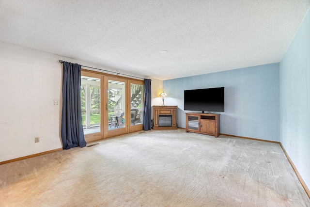 2017 87th Trl N, Brooklyn Park, MN 55443 - unfurnished living room featuring carpet floors and a textured ceiling