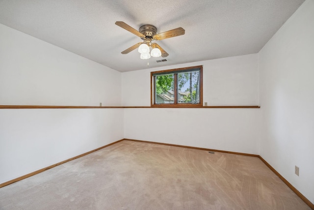 2017 87th Trl N, Brooklyn Park, MN 55443 - empty room featuring light carpet, ceiling fan, and a textured ceiling