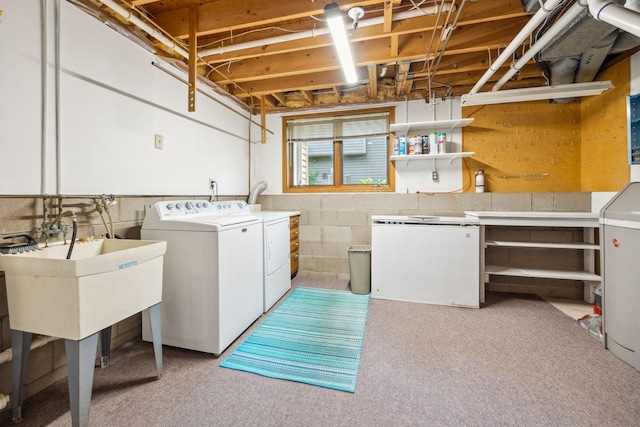 2017 87th Trl N, Brooklyn Park, MN 55443 - washroom with washing machine and dryer, carpet, and concrete block wall