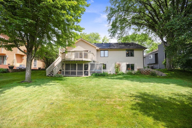 2017 87th Trl N, Brooklyn Park, MN 55443 - back of house featuring a sunroom, a yard, stairway, and a deck