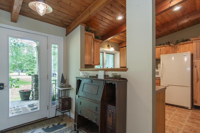 8619 Dove St, Breezy Point, MN 56472 - kitchen with freestanding refrigerator, a wooden ceiling with exposed beams, recessed lighting, and light tile patterned floors