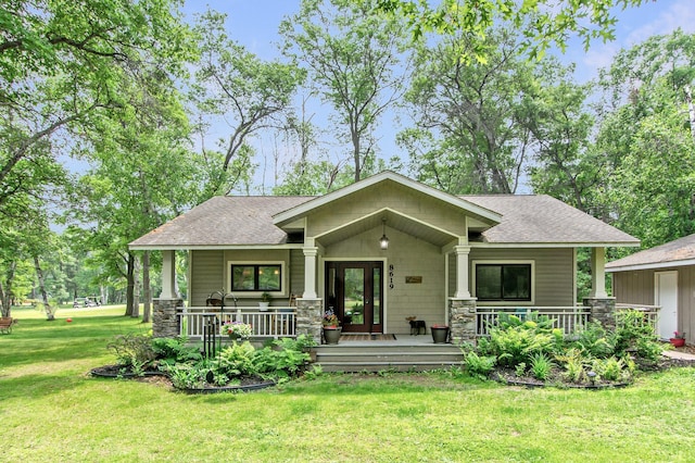 8619 Dove St, Breezy Point, MN 56472 - view of front of property featuring a shingled roof, covered porch, and stone siding