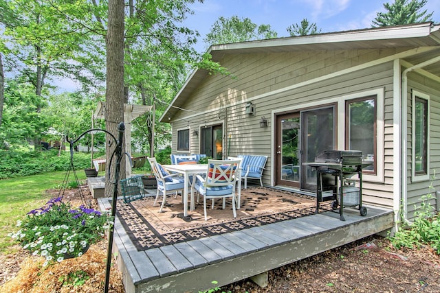8619 Dove St, Breezy Point, MN 56472 - deck with a grill and outdoor dining area
