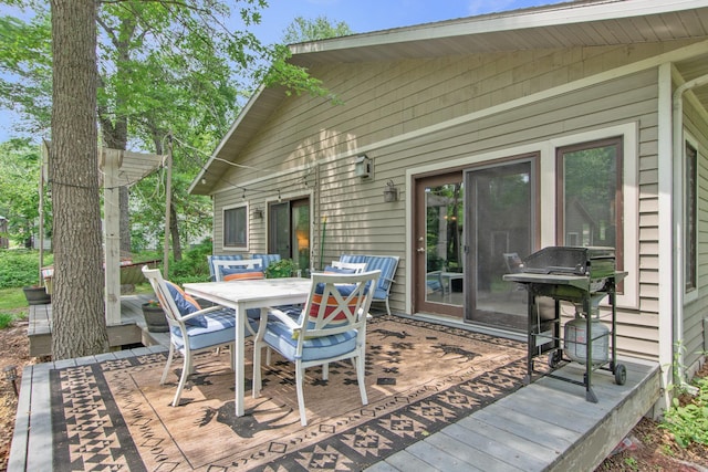 8619 Dove St, Breezy Point, MN 56472 - wooden deck featuring area for grilling and outdoor dining area