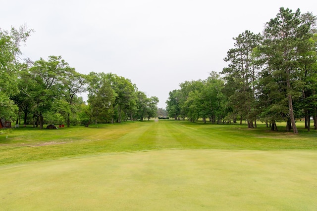 8619 Dove St, Breezy Point, MN 56472 - view of property's community with a yard, view of scattered trees, and view of golf course