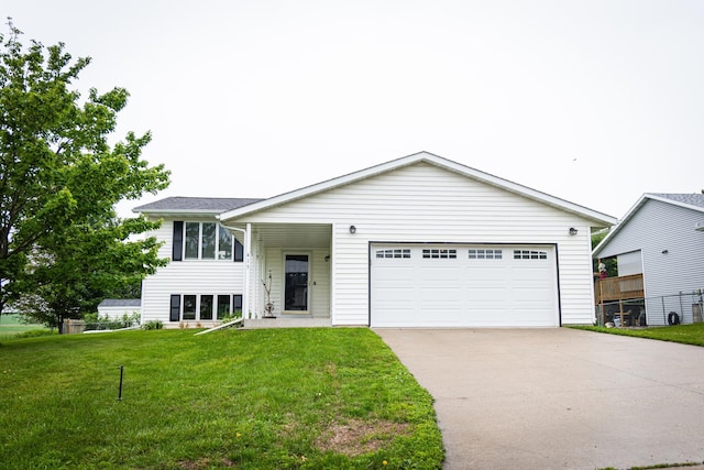 415 3rd St NW, Elgin, MN 55932 - view of front facade featuring concrete driveway and an attached garage