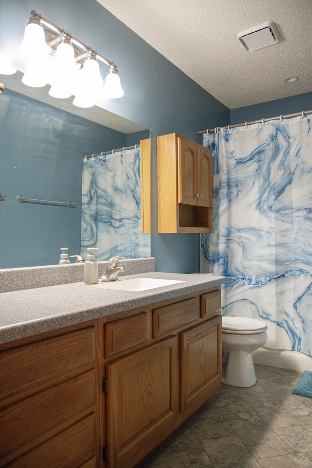 415 3rd St NW, Elgin, MN 55932 - bathroom with vanity, a textured ceiling, and curtained shower