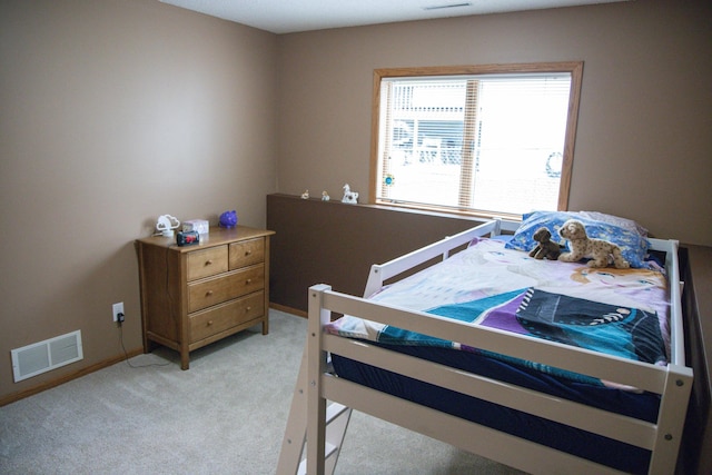 415 3rd St NW, Elgin, MN 55932 - bedroom featuring light carpet and baseboards