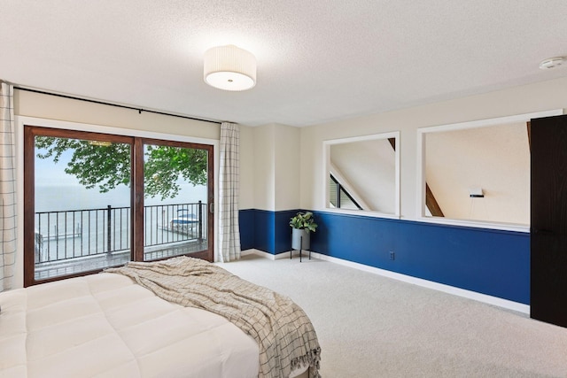 6641 Halstead Ave, Mound, MN 55364 - carpeted bedroom featuring access to outside and a textured ceiling