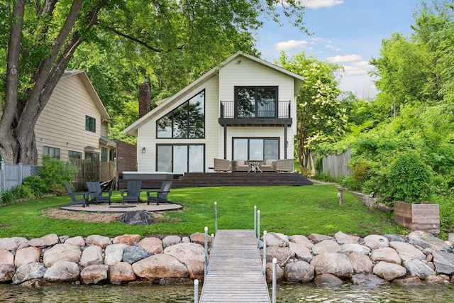 6641 Halstead Ave, Mound, MN 55364 - back of property featuring a balcony, a patio area, a hot tub, and a water view