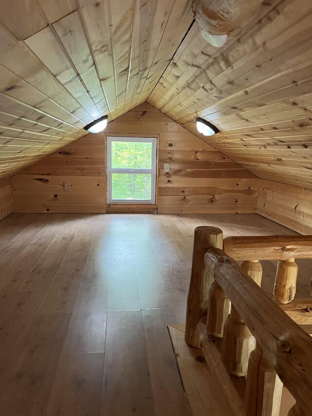 38010 Clover Cir, Hinckley, MN 55037 - additional living space featuring hardwood / wood-style floors, lofted ceiling, wood walls, and wood ceiling