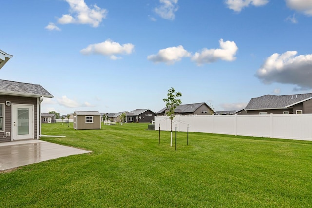 755 Escalade Ln SE, Owatonna, MN 55060 - view of yard with a residential view, a patio area, and a shed