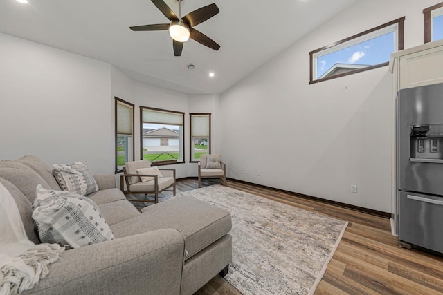 755 Escalade Ln SE, Owatonna, MN 55060 - living room featuring vaulted ceiling, wood finished floors, recessed lighting, and ceiling fan