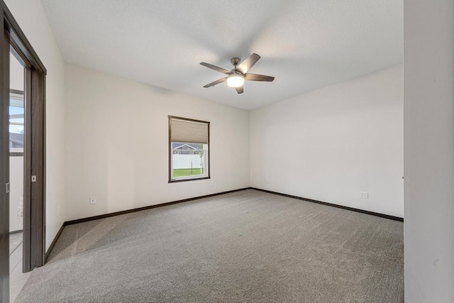 755 Escalade Ln SE, Owatonna, MN 55060 - carpeted spare room featuring ceiling fan and baseboards