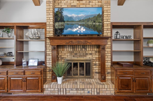 17208 Woodbine St NW, Andover, MN 55304 - living area with a brick fireplace and dark wood-type flooring