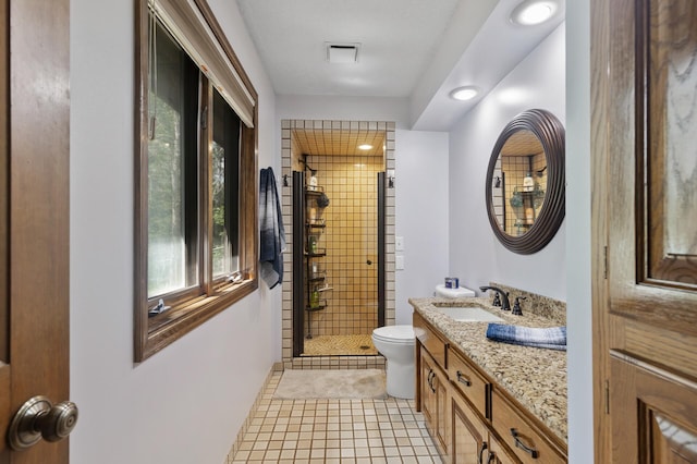 17208 Woodbine St NW, Andover, MN 55304 - full bathroom featuring a shower stall, vanity, tile patterned flooring, and recessed lighting