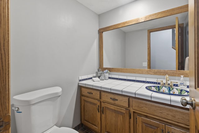 17208 Woodbine St NW, Andover, MN 55304 - bathroom with toilet and vanity