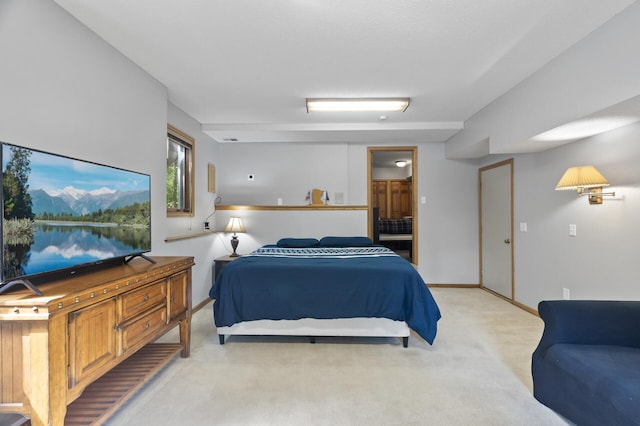 17208 Woodbine St NW, Andover, MN 55304 - bedroom with light carpet and ensuite bathroom