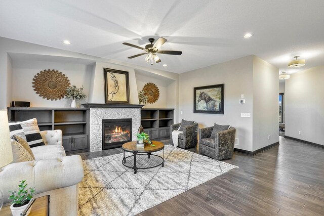 13566 Birdsong Path, Rosemount, MN 55068 - living area with ceiling fan, wood finished floors, a fireplace, and recessed lighting