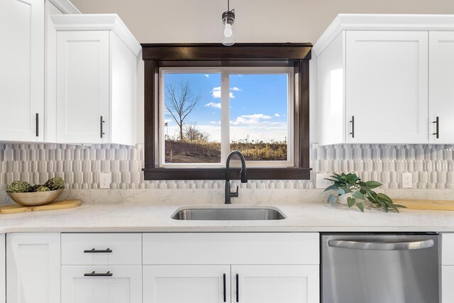 13566 Birdsong Path, Rosemount, MN 55068 - kitchen with stainless steel dishwasher, white cabinets, and decorative backsplash