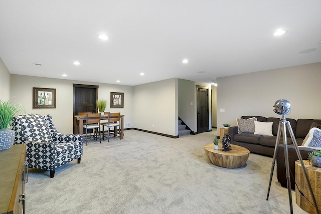 13566 Birdsong Path, Rosemount, MN 55068 - living room featuring stairway, light colored carpet, and recessed lighting