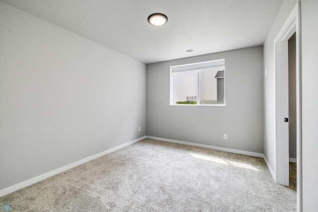 2600 74th Ave S, Fargo, ND 58104 - carpeted empty room with baseboards