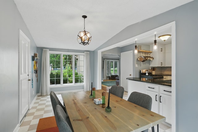 3826 Adair Ave N, Crystal, MN 55422 - dining room featuring vaulted ceiling and light floors