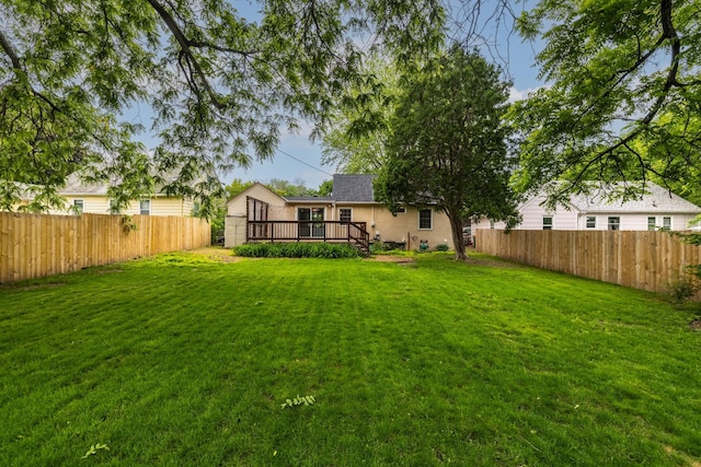 3826 Adair Ave N, Crystal, MN 55422 - fenced backyard with a deck
