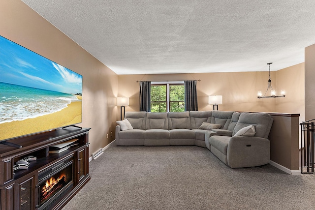1202 Matteson St, Faribault, MN 55021 - carpeted living room featuring a chandelier and a textured ceiling