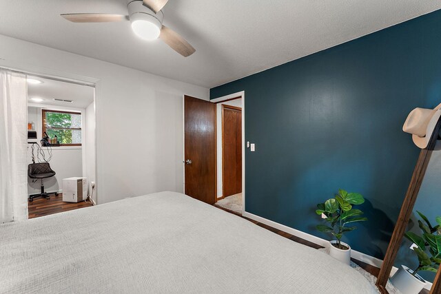 1202 Matteson St, Faribault, MN 55021 - bedroom featuring a ceiling fan and baseboards