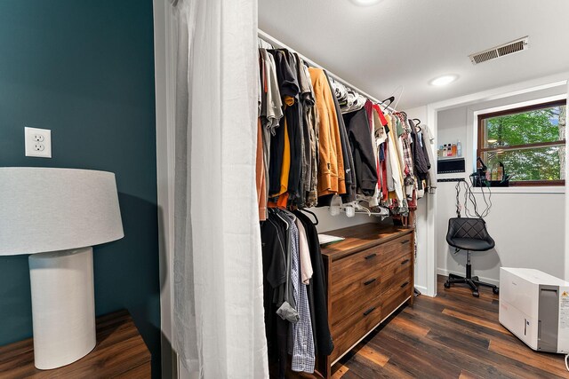 1202 Matteson St, Faribault, MN 55021 - walk in closet featuring dark wood-type flooring