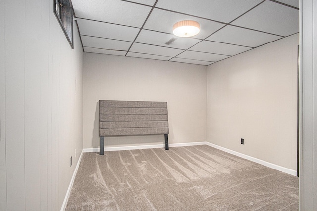 201 Elm St, Luverne, MN 56156 - finished basement featuring carpet and a paneled ceiling