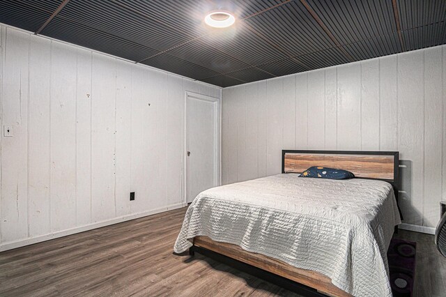 201 Elm St, Luverne, MN 56156 - bedroom featuring wood finished floors and baseboards