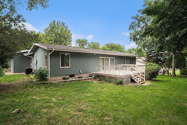 201 Elm St, Luverne, MN 56156 - view of front facade with a deck and a front yard