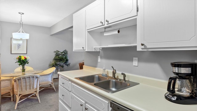 4397 Wilshire Blvd # E305, Mound, MN 55364 - kitchen with white cabinets, light countertops, decorative light fixtures, light carpet, and open shelves