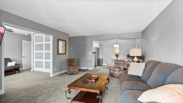 4397 Wilshire Blvd # E305, Mound, MN 55364 - carpeted living area featuring baseboards