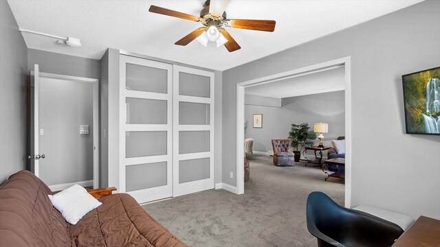 4397 Wilshire Blvd # E305, Mound, MN 55364 - living area with carpet and ceiling fan