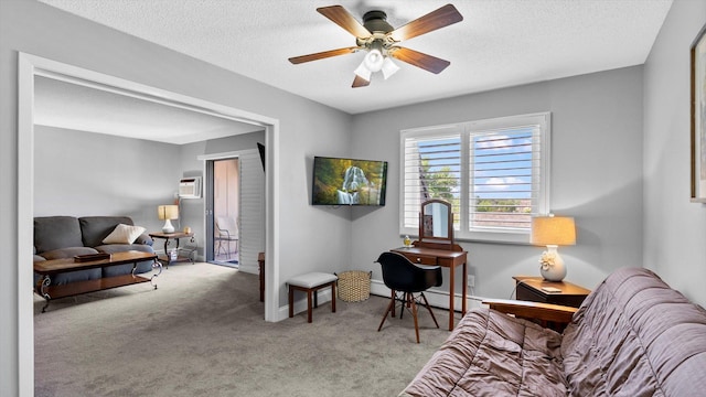 4397 Wilshire Blvd # E305, Mound, MN 55364 - living area with carpet floors, a baseboard heating unit, a ceiling fan, a wall mounted air conditioner, and a textured ceiling