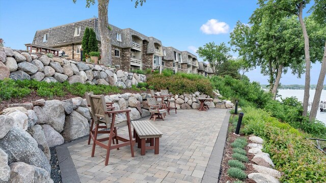 4397 Wilshire Blvd # E305, Mound, MN 55364 - view of patio with a water view