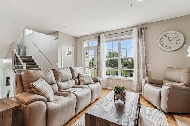 1842 Colonial Ln Unit 6, Chanhassen, MN 55317 - living room with stairway and light wood-style floors