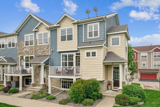 1842 Colonial Ln Unit 6, Chanhassen, MN 55317 - townhome / multi-family property with a shingled roof and stone siding