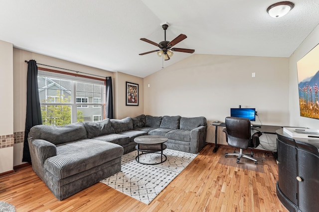 1842 Colonial Ln Unit 6, Chanhassen, MN 55317 - living room featuring ceiling fan, wood finished floors, lofted ceiling, and a desk