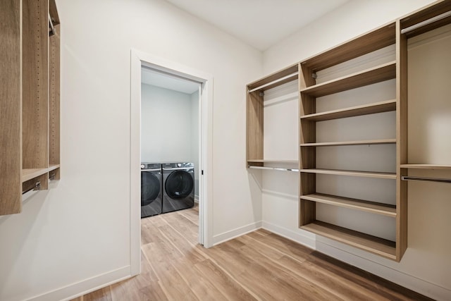 3909 54th St, Edina, MN 55424 - spacious closet featuring wood finished floors and separate washer and dryer